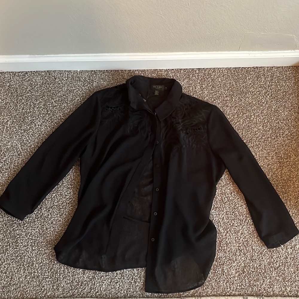 Black chiffon blouse with collar bone flower detail